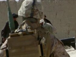 WS ZO National police greeting to civilian / Musa Qala, Helmand Province, Afghanistan. Stock Footage