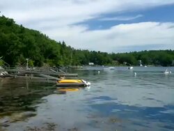 WA T/L clouds and tide, boats moving with tide, Maine, USA Stock Footage
