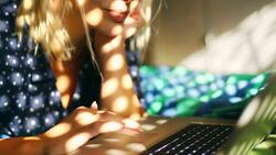 Woman browsing the internet on her laptop. Stock Footage