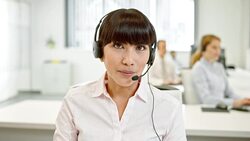 LD Female call center operator making a video call Stock Footage