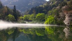 Wet fog moving over Seryangji lake(Reservoir in the Hwasun) Stock Footage