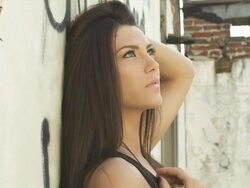 HD: Girl relaxes on wall Stock Footage