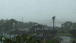 Ambulance Drives In Dangerous Wind And Rain During Typhoon Meranti Stock Footage