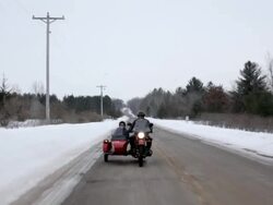 MS  POV Husband and wife ridding on motorcycle with sidecar in rural area during winter / Osceola, Wisconsin, United States Stock Footage
