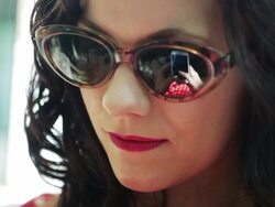 Texting with sunglasses        LI CM Stock Footage