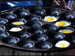 Food Preparation: Fried Quail, Partridge Eggs In Shallow Pan Stock Footage