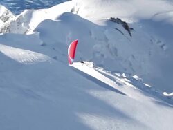 WS TS AERIAL red paramotor soaring to up to the summit of the mont blanc / chamonix, Haut savoir, france  Stock Footage