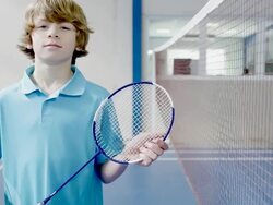 MS ZI Young boy holding racket / Albi, Midi-Pyrennees, France Stock Footage