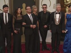 Morleigh Steinberg, The Edge, Alison Hewson, Bono, Ann Acheson, Larry Mullen Jr., Adam Clayton and Mariana Teixeira - 86th Annual Academy Awards - Arrivals Stock Footage
