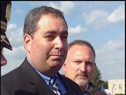 Transportation security officials removed passengers from a Bermuda-bound flight Thursday at Philadelphia's airport after reports that someone was helping to load the plane without a security badge. News Clip