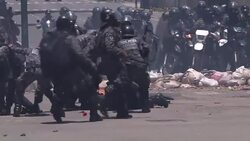 CLEAN : Explosion hits security forces in Caracas (2) News Clip