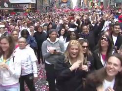 ATMOSPHERE: Revlon Run Walk participants at the 14th Annual NY EIF Revlon Run/Walk Stock Footage