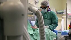 Surgeon operates a patient in operating room Stock Footage