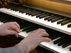 MS Organist at church organ playing / Saarburg, Rhineland-Palatinate, Germany Stock Footage