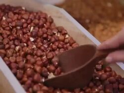 Customer purchases hazelnut in grocery Stock Footage