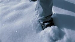 A man trudges through deep snow. Stock Footage