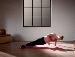 Woman doing her workout in gym (pelvis lift laterally) Stock Footage