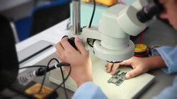 technician working on microscope Stock Footage