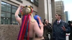 CLEAN : Femen stage bare breasted protest on sidelines of G7 News Clip