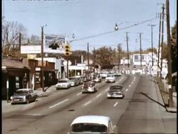 Teenager jackrabbiting at traffic lights Stock Footage