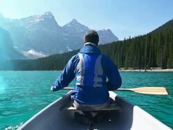 Canoeing on Mountain Lake #2 Stock Footage