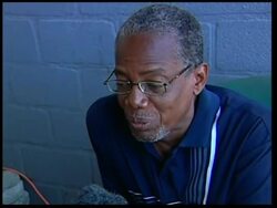 Death toll still uncertain as more bodies collected in streets and open graves GRAPHIC News Clip