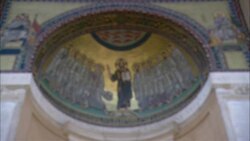 A fresco in St. Peter's Basilica depicts hand painted religious figures. Stock Footage