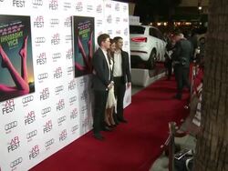 Nick Rowland, Miranda Ballesteros, and Michelangelo Fan at AFI FEST 2014 Presented By Audi - Gala Premiere Of "Inherent Vice" Stock Footage