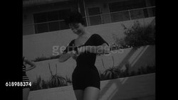 Vintage swimwear with contemporary models exhibiting woolen suits News Clip