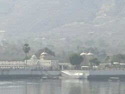 Pull back Udaipur Lake Palace Rajasthan India Stock Footage