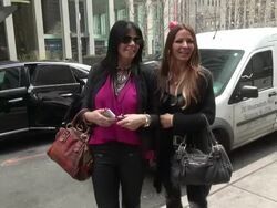 Alicia DiMichele Garofalo and Drita D'Avanzo outside of the McGraw Hill building in Rockefeller Center in New York City - Celebrity Sightings in New York City, NY on 12/02/13 Stock Footage