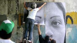 CLEAN: Giant portraits on Caracas streets to raise crime awareness News Clip