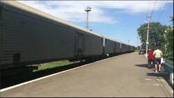 Train with refrigerated carriages prepares to transport bodies of crash victims News Clip