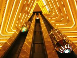 MS POV T/L Interior of hotel and  Elevator moving up down / Doha, Qatar Stock Footage