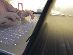 woman Typing at Keyboard,Dolly shot Stock Footage
