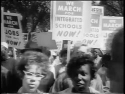 B/W August 28, 1963 close up crowd marching with signs towards camera / March on Washington / newsreel Stock Footage