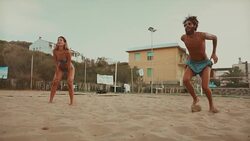 Friends play beach volley and have fun Stock Footage