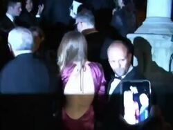 Rosie Huntington- Whiteley and Jason Statham at the Costume Institute Gala at the Metropolitan Museum of Art after Party in New York 05/02/11 (Footage by WireImage Video/GettyImages) Stock Footage