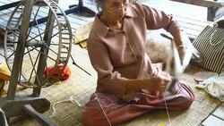 Women make thread for weaving ,Thailand Stock Footage