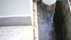 Running water out of Pipe Stock Footage