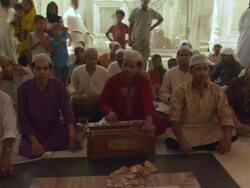 MS PAN ZI People singing in Mausoleum of Nizamuddin Dargah, area of Sufi Saint / New Delhi, Delhi, India Stock Footage