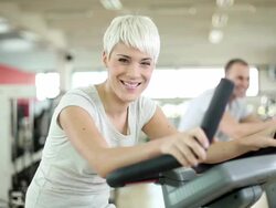 Young woman cycling Stock Footage