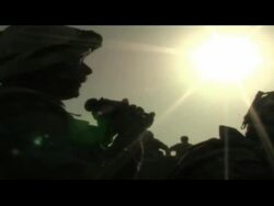 British Royal Marine Fire Support Group setting up machine guns and coming under fire Stock Footage
