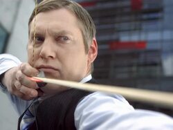 HD Super Slow-Mo: Businessman Shooting An Arrow Stock Footage