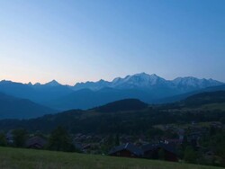 Time Lapse tracking shot night to day in front of Mont Blanc chain Stock Footage