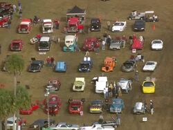 MS AERIAL Shot of US Classic Car Exhibition with people / South Carolina, United States Stock Footage