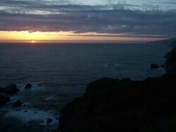 WS T/L View of Sunset from day to night over ocean / Big Sur, California, United States Stock Footage