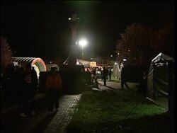 Night scenes from quake- damaged area, tents, survivors News Clip