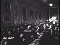 1949: THE PONTIFICAL NORTH AMERICAN COLLEGE: Priests & Cardinal at table head, Blessing food (no SOT), seminary students eating family style at long tables in dining room, men clearing plates. Formation & study of diocesan priesthood, Roman Catholic Instructional Video