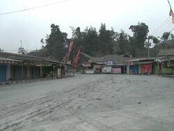 Small village abandoned and coated in volcanic ash mud after eruption of Merapi volcano; Indonesia. 7 November 2010 / AUDIO Stock Footage